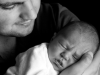 man holding a baby