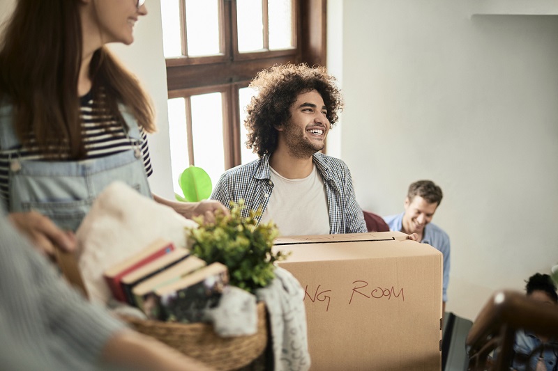 People packing boxes and moving